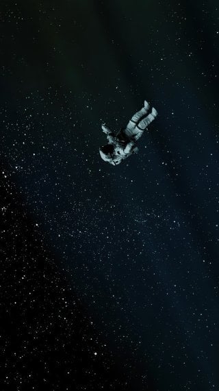 Astronaut alone in space Wallpaper