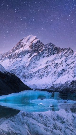 Estrellas sobre montañas en Nueva Zelanda Fondo de pantalla