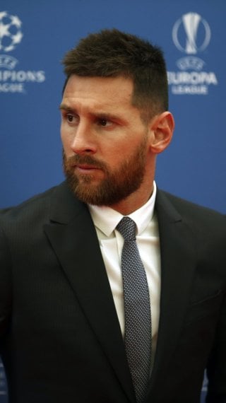 Messi in a suit Wallpaper
