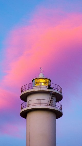 Lighthouse at sunset Wallpaper